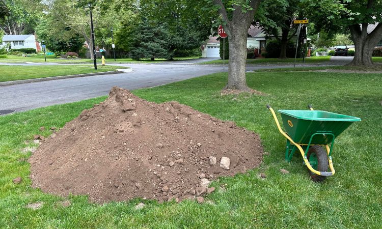 How Much Does a Cubic Yard of Topsoil Weigh?